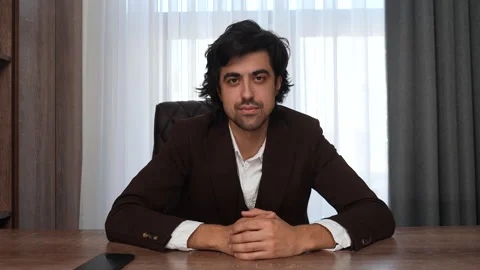 Webcam view of businessman in suit using laptop remote for business meeting Video stock 262092813