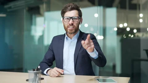 Webcam view of irritated arguing angry mature boss business man looking at  Stock Footage 234139650