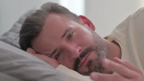 Webcam View of Man Doing Video Chat in Bed Video stock 287899462