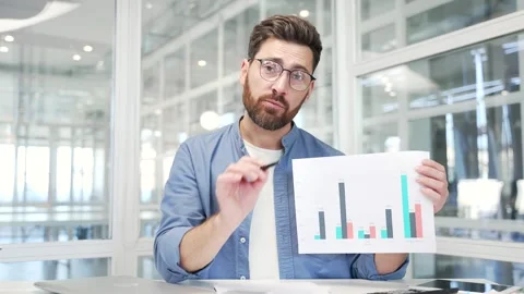 Webcam view. Professional male manager presenting chart data by video call look Stock Footage 326896867