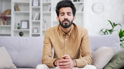 Webcam view. Young handsome bearded male student listens to online e-learning  Stock Footage 252213332