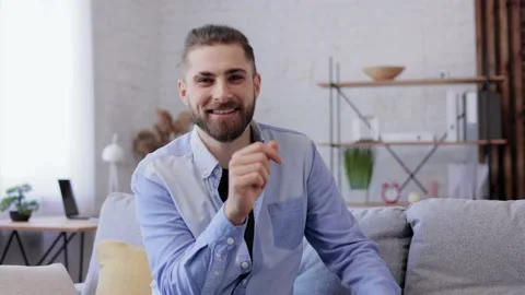 Webcam view.Handsome young man talking to web camera. Communication online with Video stock 181503462