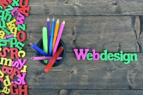 Webdesign on wooden table Stock Photos