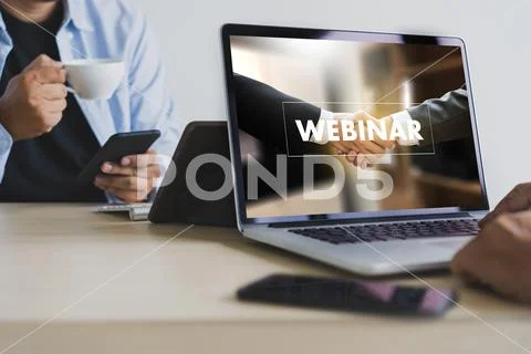 WEBINAR hand on table use E-business Browsing Connection in computer, coffee, Stock Photos