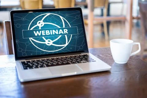 WEBINAR hand on table use E-business Browsing Connection in computer, coffee Stock Photos