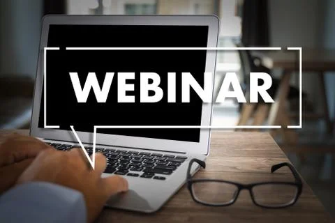 WEBINAR hand on table use E-business Browsing Connection in computer, coffee  Stock Photos