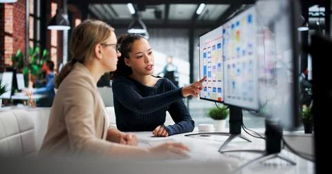 Webinar Hosts Guide Young Female Designers Through UI/UX Services Stock Photos