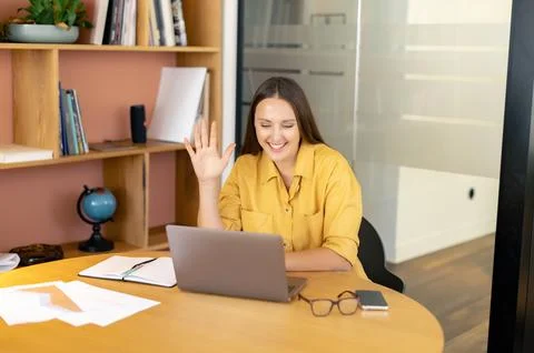 Webinar, online training, video tutorials. Young woman conducts an online Stock Photos