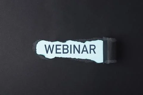 Webinar Text Revealed Through Torn Black Paper Stock Photos