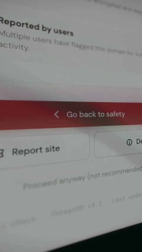 Website being flagged for suspicious activity, user clicks Go back to safety Stock Footage 333832592