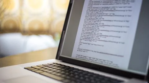 Website Coding on Laptop Computer Screen Stock Photos