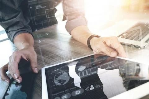 Website designer working digital tablet and computer laptop and digital des.. Stock Photos