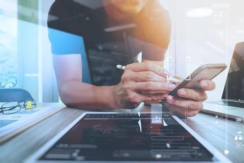 Website designer working digital tablet and computer laptop and digital des.. Stock Photos