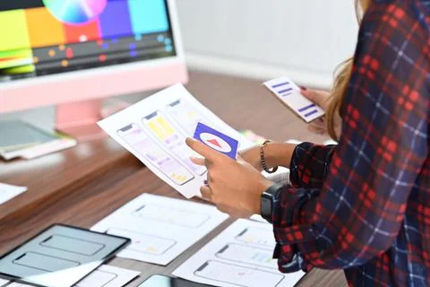 Website developer planning application development framework at design studio. Stock Photos