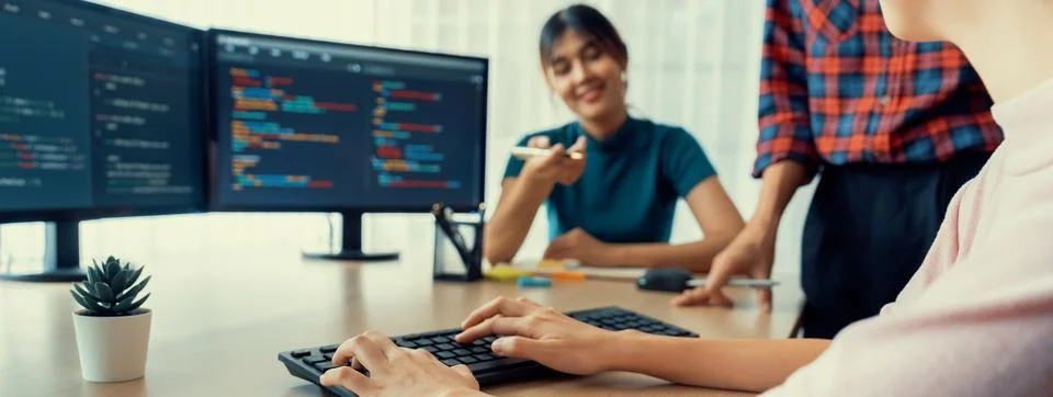 Website developer team brainstorming and sharing idea at office. Burgeoning. Foto stock