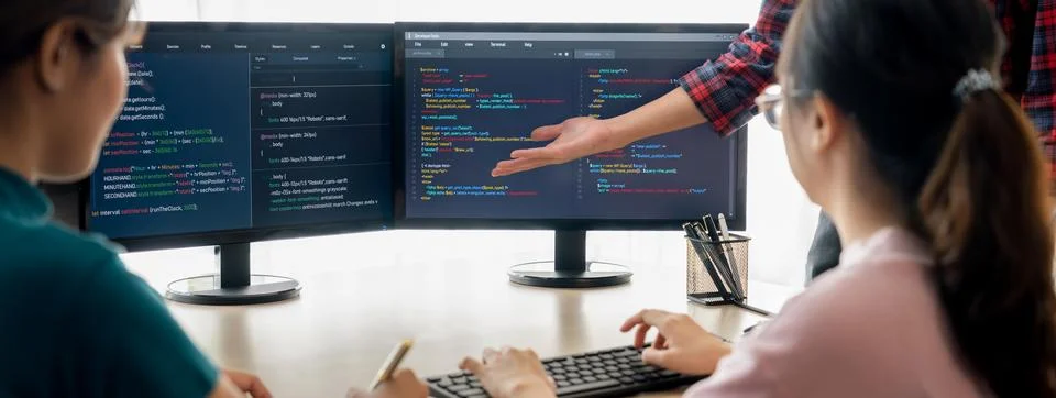 Website developer team brainstorming and sharing idea at office. Burgeoning. Stockfoto's