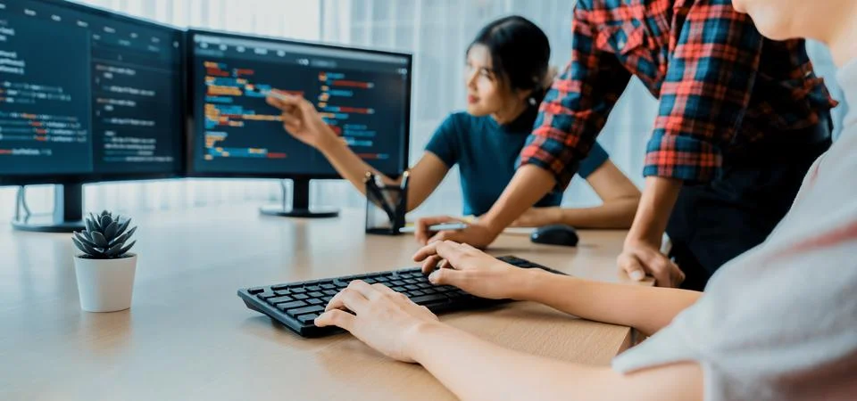 Website developer team brainstorming and sharing idea at office. Burgeoning. Stockfoto's