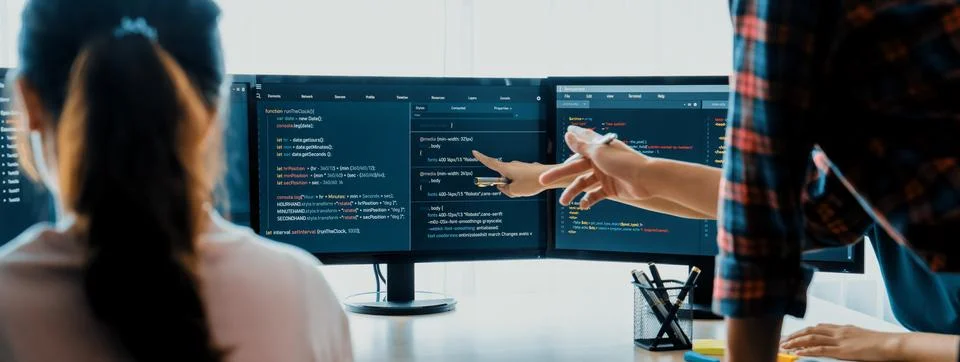 Website developer team brainstorming and sharing idea at office. Burgeoning. 스톡 사진