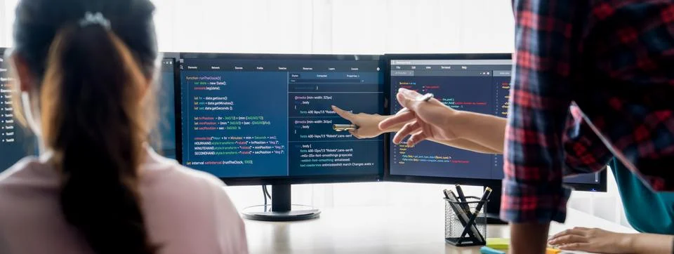 Website developer team brainstorming and sharing idea at office. Burgeoning. Stockfoto's