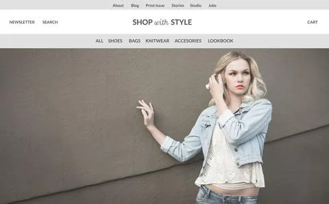 Website header is showing model wearing denim jacket and lace top against brown Ilustración de archivo