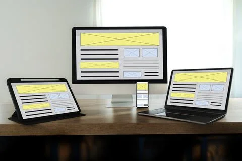 Website Internet Homepage UX developer and Designing a responsive website i.. Stock Photos