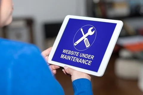 Website maintenance concept on a tablet Photos