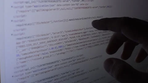 Website programmer analyzing code on his monitor. code developer programming Stock Footage 203826510