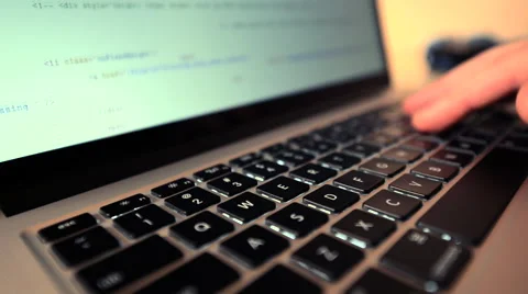 Website Programming. Programmer Working on His Laptop Computer Stock Footage 58718771