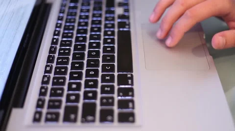 Website Using His Laptop Track Pad Stock Footage 43380887