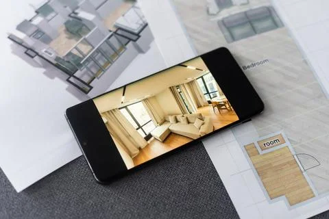 Website wireframe sketch and programming code on smartphone 写真素材