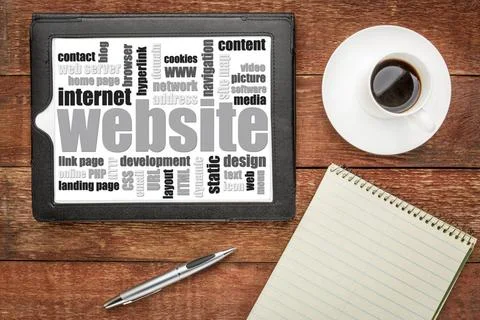  website word cloud on tablet website word cloud on a digital tablet - top... Fotos de archivo