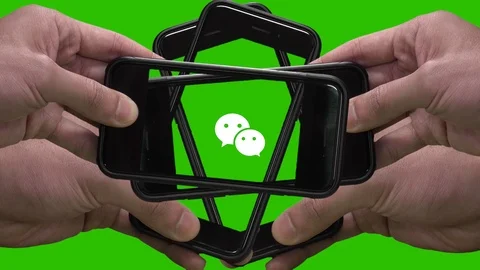 WECHAT(WEIXIN) message app logo on smartphone screen. Stock Footage 105157094