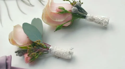 Wedding accessories on the white surface Stock Footage 57226265