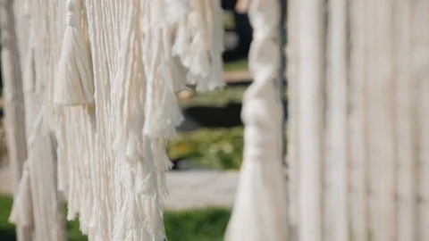 Wedding altar. Macrame threads hang down, develop in the wind. Stock Footage 124067045