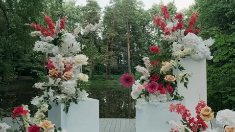 Wedding arch against the backdrop of a green forest Stock Footage 309497405