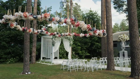 Wedding arch, chairs for guests, wedding accessories and decorations. 動画素材 236201895
