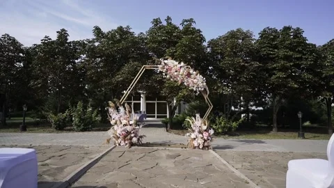 Wedding arch with decorations made of artificial flowers Stock Footage 172192539