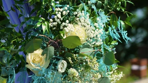 Wedding arch outdoors close up. Arch is decorated with flower arrangements of Stock Footage 250997541