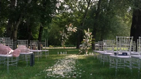 Wedding arch of white rose flowers the wedding ceremony of the bride and groom Stock Footage 282909741