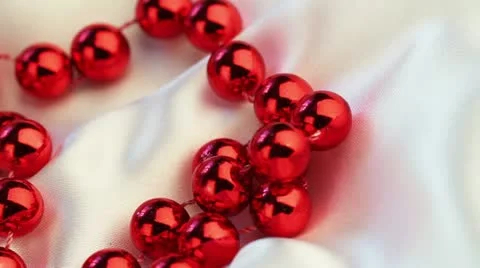 Wedding background. beads on silk spinning closeup Stock Footage 12527891