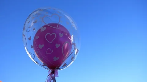Wedding balloon fluttering in the wind Stock Footage 104879024