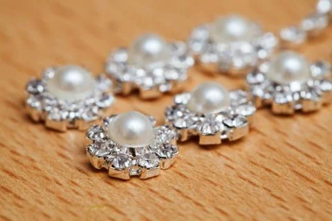 Wedding bijouterie of a bride on table. Close-up Stock Photos