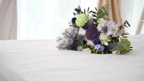 Wedding bouquet for bride on the bed Stock Footage