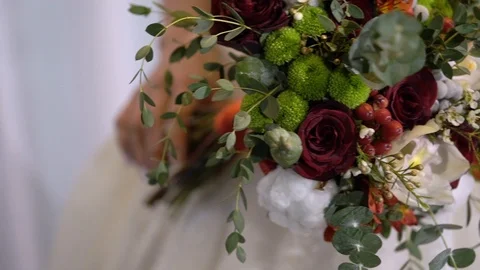 Wedding bouquet in bride hands Stock Footage 86402868