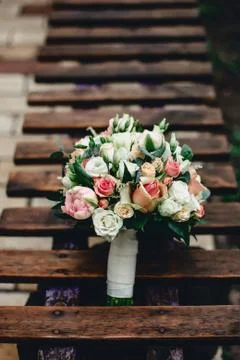 Wedding bouquet for bride from roses and other great flowers Stock Photos