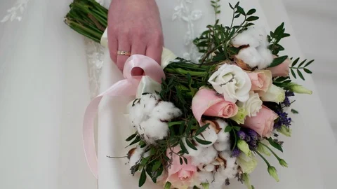 Wedding bouquet in the bride's hand Stock Footage 99336329