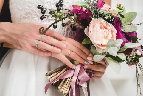 Wedding bouquet in bride's hand Stock Photos