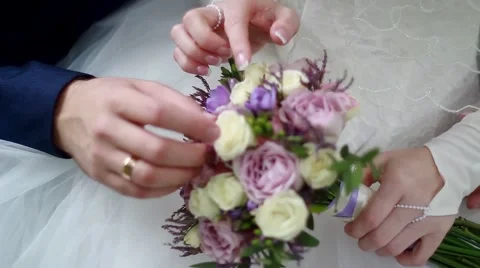 Wedding bouquet at bride's hands Stock Footage 52189997