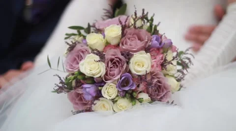 Wedding bouquet at bride's hands Stock Footage 52190037