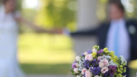 Wedding bouquet at bride's hands Stock Footage 53057900